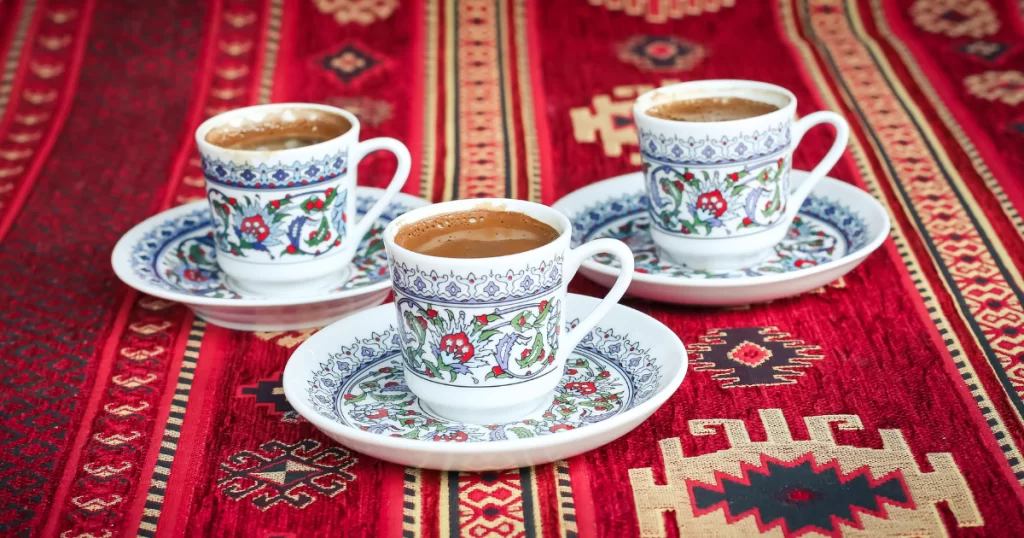 Three beautiful Turkish coffees on the amazing red carpet