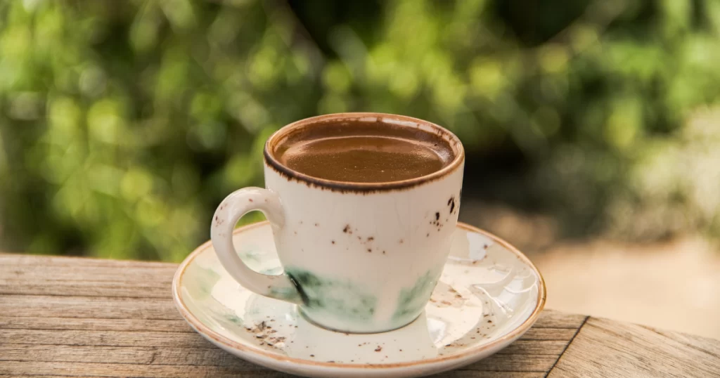 Turkish coffee in the nature on the wood table